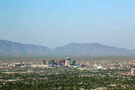 Phoenix Arizona cityscape with desert mountain range