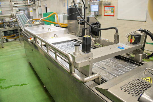 Industrial Automated Thermoforming Packaging Machine on Production Line