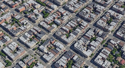 Fototapeta premium Aerial view of residential neighborhood with brownstone buildings and tree lined streets