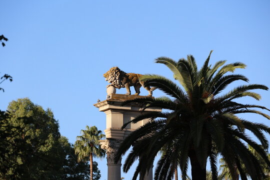 Lion statue in the Murillo Gardens in Seville, Andalusia, Spain  