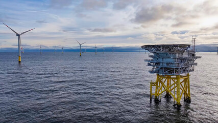 Offshore wind farm with electrical platform over the ocean © WILL PHOTOGRAPHY