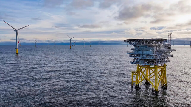Offshore wind farm with electrical platform over the ocean