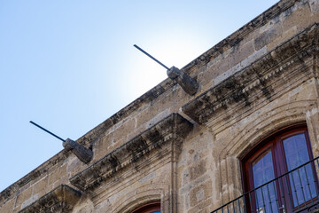 Colonial Stone Facade Detail with Balcony and Architectural Corbels in Guadalajara © sandor