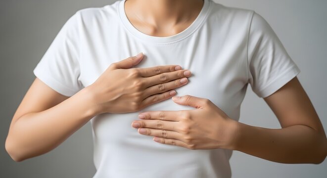 Breast cancer awareness woman performing self examination for early detection
