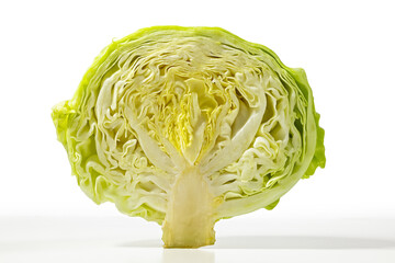Obraz premium Close-Up of Fresh Green Cabbage Cross-Section on White Background for Food Art and Health Concepts