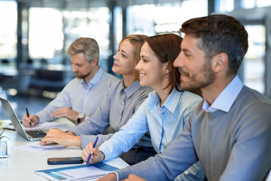 Business meeting - manager discussing work with his colleagues.
