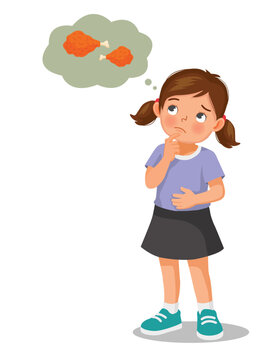 Little girl feeling hungry thinking of eating fried chicken
