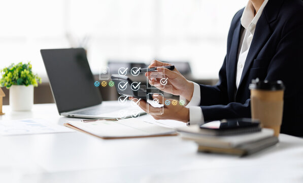 Business woman Documents, Business analysis summary graph reports of business operating expenses and work data about the company's financial statements.

