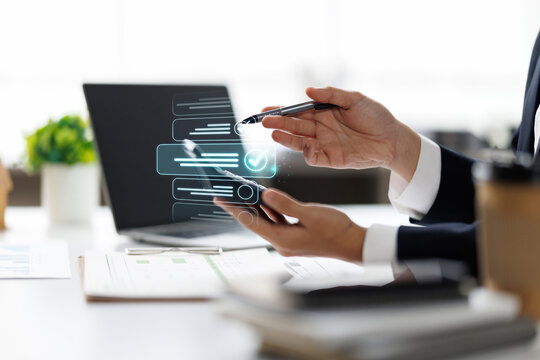 Business woman Documents, Business analysis summary graph reports of business operating expenses and work data about the company's financial statements.
