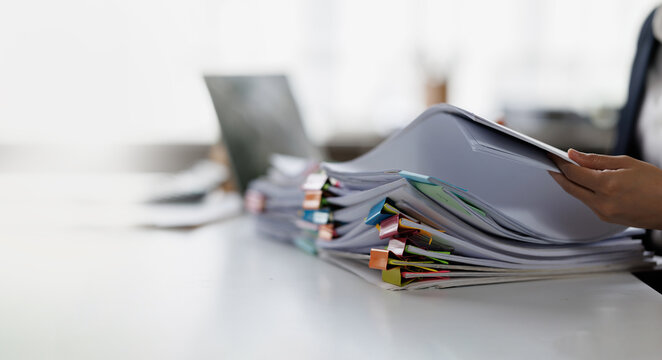 Documents, Business , Auditor businesswoman checking searching document legal prepare paperwork or report for analysis TAX time,accountant Documents data contract partner deal in workplace office