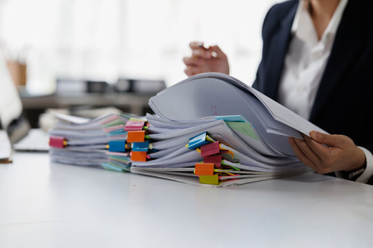 Documents, Business , Auditor businesswoman checking searching document legal prepare paperwork or report for analysis TAX time,accountant Documents data contract partner deal in workplace office