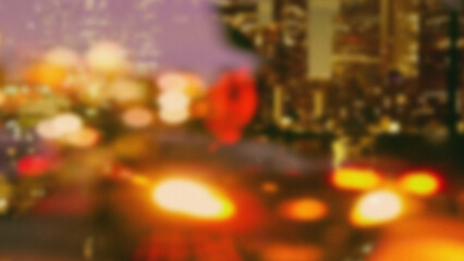 Blurry city street at night with car lights © Creative_Art