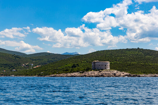Historical stone architecture of the circular Mamula Fort on a secluded island at the entrance to the Bay of Kotor