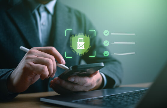 Business professional using secure mobile authentication with digital privacy interface. Concept of cybersecurity, data protection, identity verification, secure access, encryption, mobile security.