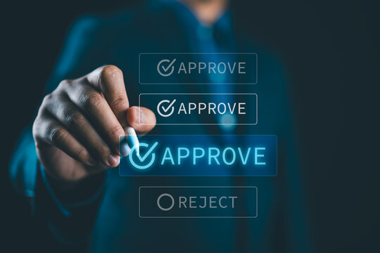 Business executive selecting approve option on virtual interface with stylus pen, digital approval workflow system and online authorization management concept for corporate decision process.