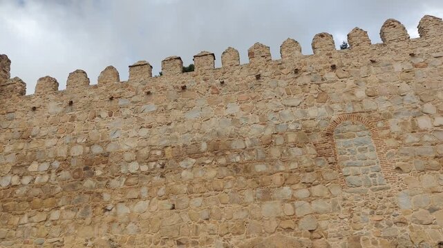 Medieval stone walls of the fortress of avila in spain