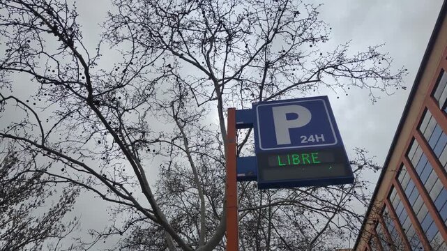 Smart parking sign displaying availability and information