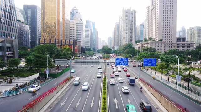 Busy urban boulevard with skyscrapers and traffic in a modern Chinese city