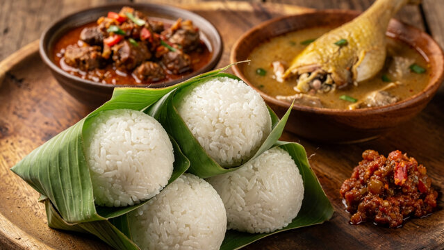 Traditional Nasi Penggel Kebumen Shaped Rice Balls with Beef Curry
