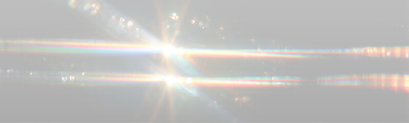 Bright light rays and colorful reflections create a shimmering effect on a smooth surface, showcasing a dynamic interplay of colors and light patterns in a visually striking manner © newname02