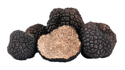 Obraz premium Black truffles with one cut in half showing marbled interior
