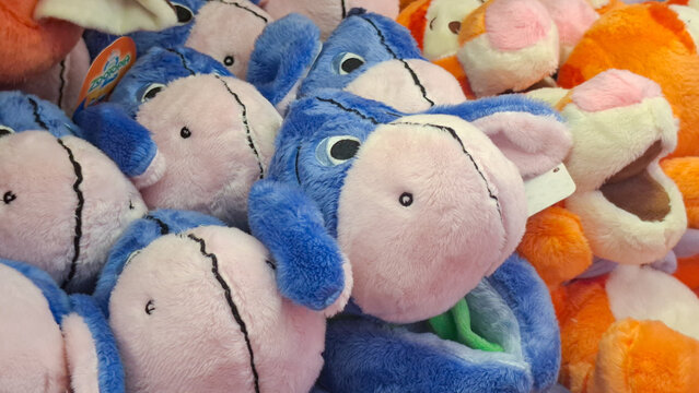 Assorted cute Eeyore and Tigger plush toys from Winnie the Pooh franchise piled together on May 18, 2026 in Bangkok, Thailand