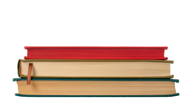 Stack of three hardcover books red beige, and tan with green spine