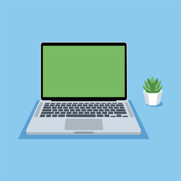 Open laptop with green screen on desk and small potted plant in minimal workspace