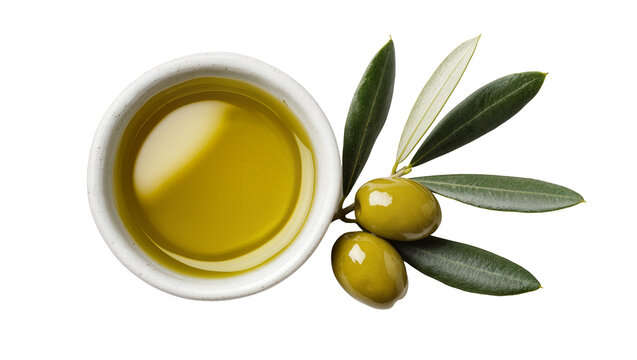 Olive oil in bowl with olives and leaves