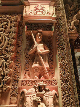 Intricate stone sculpture of a guardian and elephant at Baba Balaknath temple in Jodhpur, India.