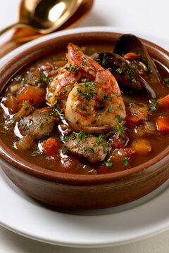 Hearty seafood stew with shrimp and mussels in a rich tomato broth
