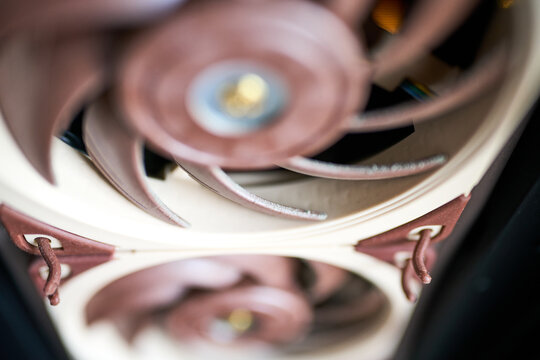 Dusty computer fans inside a gaming PC case