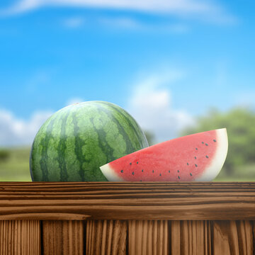 A whole green striped watermelon and a juicy red slice rest on a wooden surface against a blurred sunny sky background