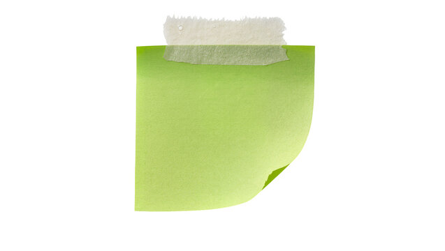 Green sticky note with torn tape attached