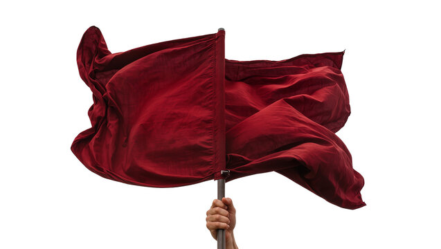 Waving red fabric flag held by hand