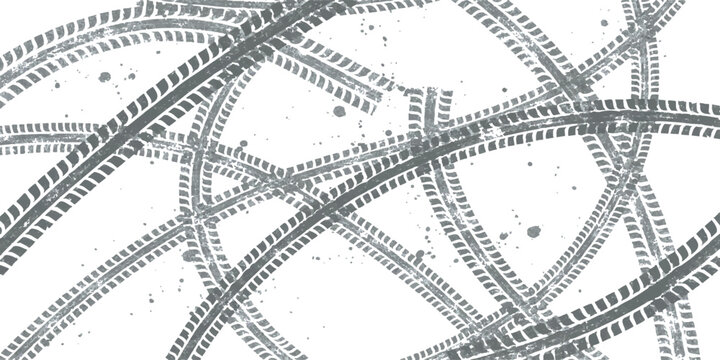 Black tire tracks and skid marks pattern on a surface