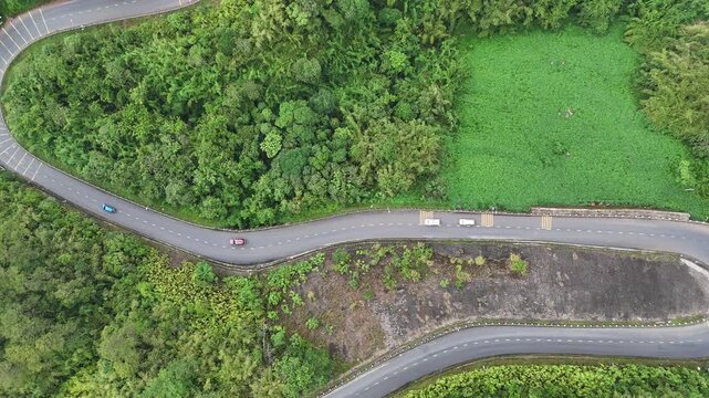 Top Down Drone View of Winding Mountain Road With Hairpin Turns Near Ta Dung Lake, Dak Nong, Vietnam
