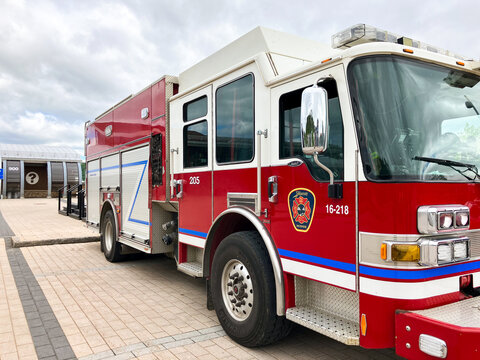 Saguenay, Quebec, Canada, June 7, 2026 - Side view of Saguenay town fire engine parked in the port area of La Baie neighbourhood