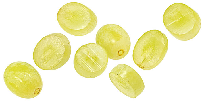 Falling green grape slices isolated on white background