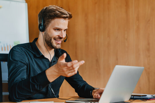 Smile, headset or attorney on technology webinar and hello or greeting hands in legal office. Man, gesture or video call conference, lawyer training workshop virtual consulting appointment.