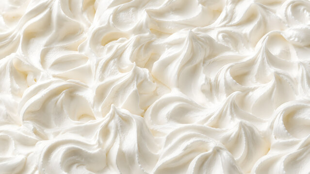 Soft Whipped Cream Texture Background in Creamy White with Swirled Peaks and Airy Folds Full Frame