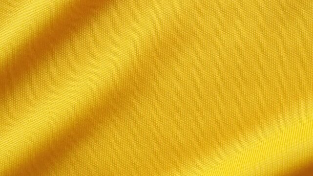 Yellow sports clothing fabric football shirt jersey texture close up