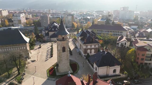 Aerial drone footage of Stephen's Tower, one of the most iconic historical landmarks in Piatra Neamt, Romania.