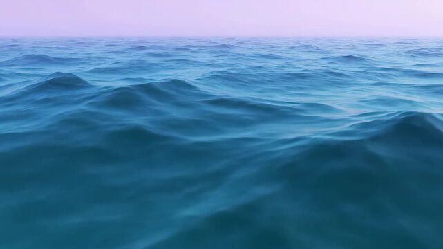 Calm Ocean Waves Under a Hazy Purple Sky, Gentle Ripples on Water Surface