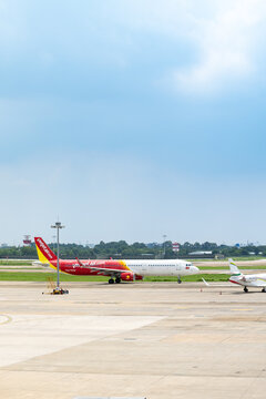 Ho Chi Minh, Vietnam - June 18, 2026: Vietjet Air aircraft taxiing on the tarmac at Tan Son Nhat International Airport, Ho Chi Minh City, Vietnam