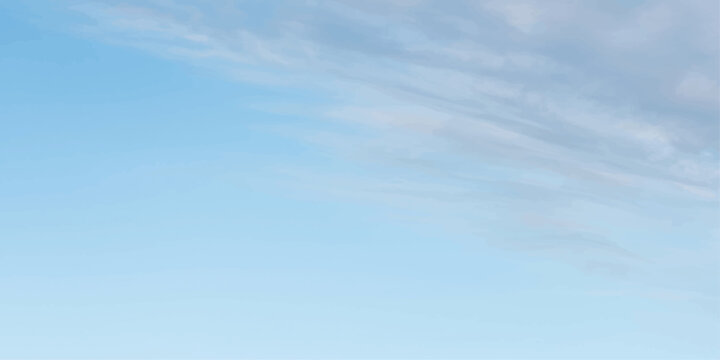 A serene blue sky with wispy clouds painted across its expanse, evoking a sense of peace and vastness.