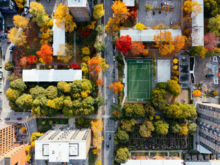 Autumn aerial view of Montreal downtown skyline with high-rise buildings under cloudy sky. g. © Artem Onoprienko