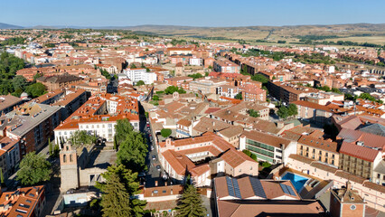 Obraz premium Aerial view of Avila mixed urban fabric with church bell tower and red rooftops