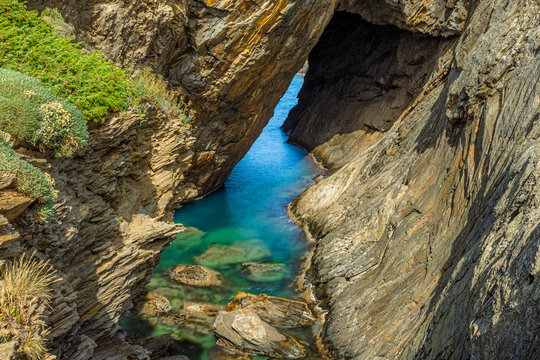 Sea Cave and Turquoise Waters at Cova de s'Infern, Cap de Creus Natural Park, Costa Brava, Spain