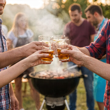 Barbecue party with people in the background, grilled steak, grilled meat, fire, summer party, barbecue in the garden, people having fun, family and friends, bbq